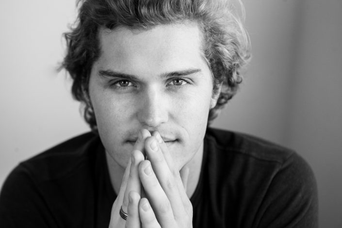 hands to mouth, black and white headshots Toronto 2414