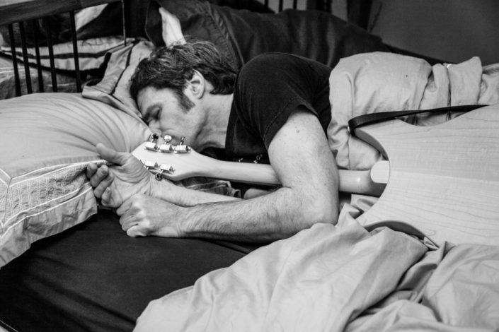 Musician sleeps with his guitar professional photographer Toronto 7746