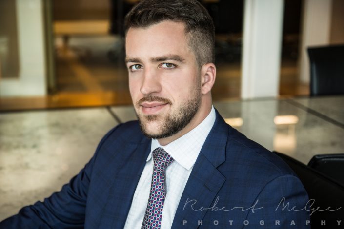 Milan at office in blue suit for headshots Toronto 0O7C7954