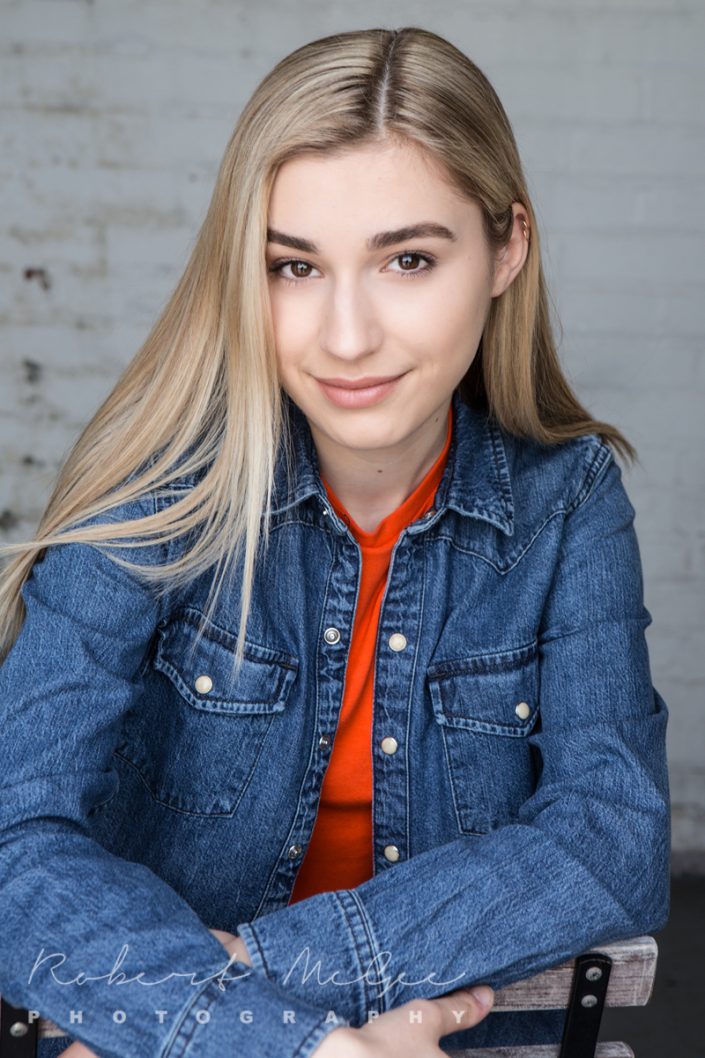 blonde female leaning on chair for actor headshots Toronto 0O7C6649