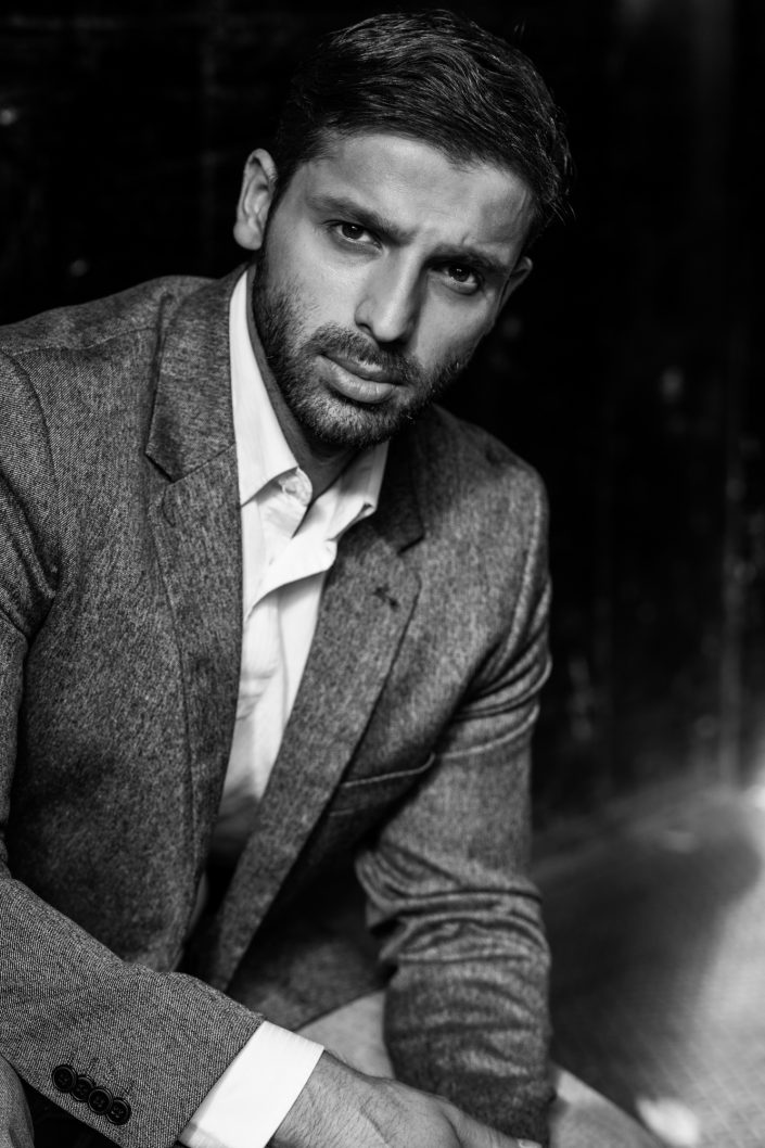 Karan wearing blazer and jeans for professional portraits in Toronto studio 019A8148