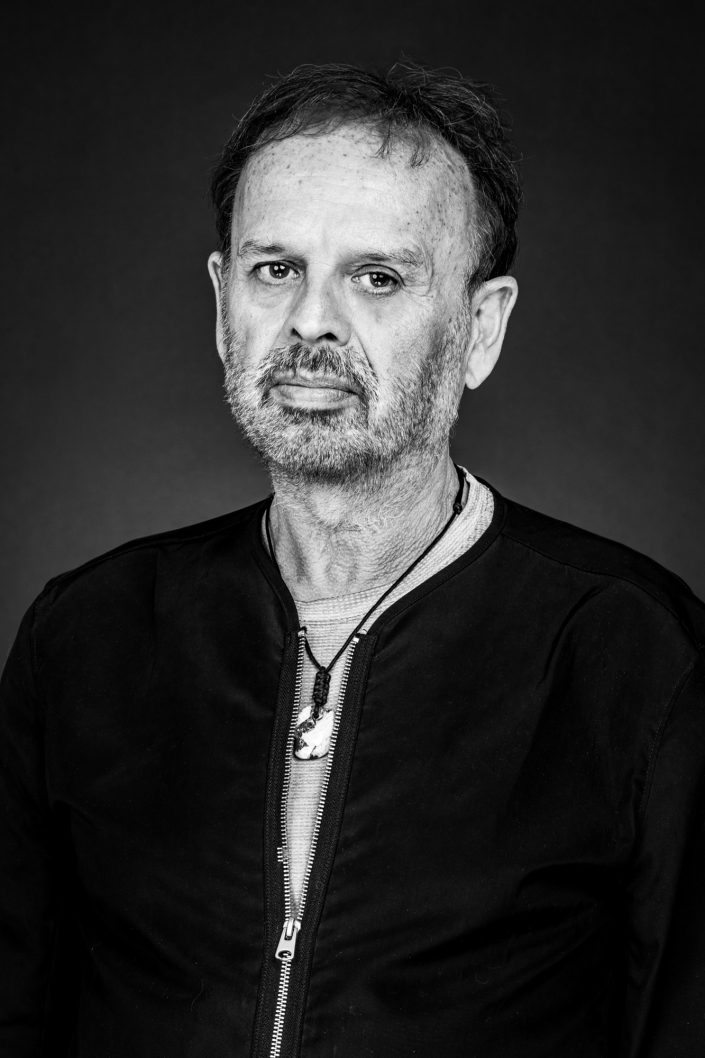 Carlos, Toronto musician headshot on dark background 019A3754