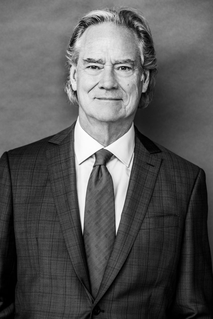 black and white portrait of Michael wearing suit and tie 019A3711